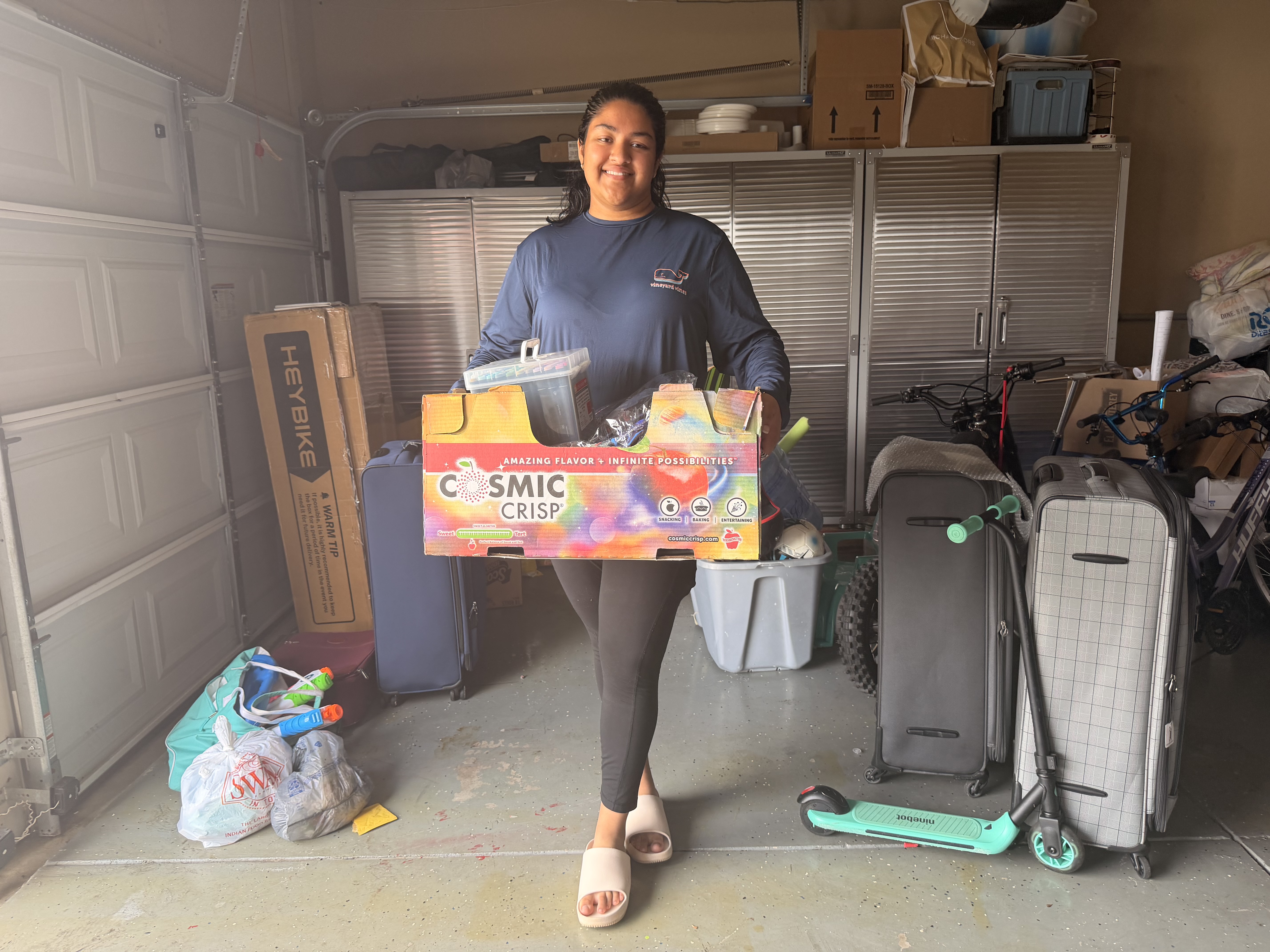 Sheena holding donations